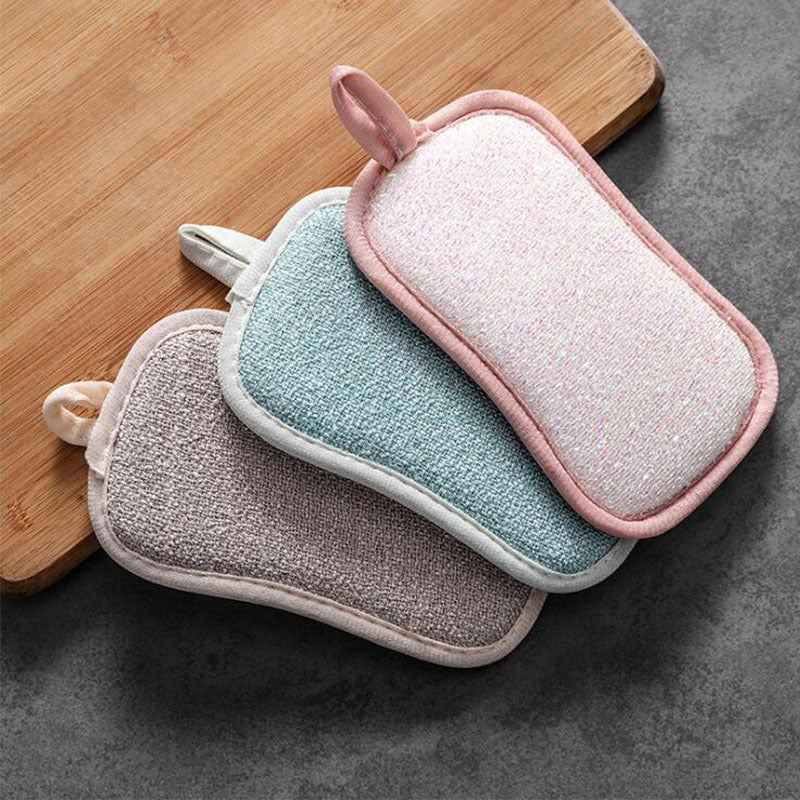 reusable microfiber sponges on wooden board